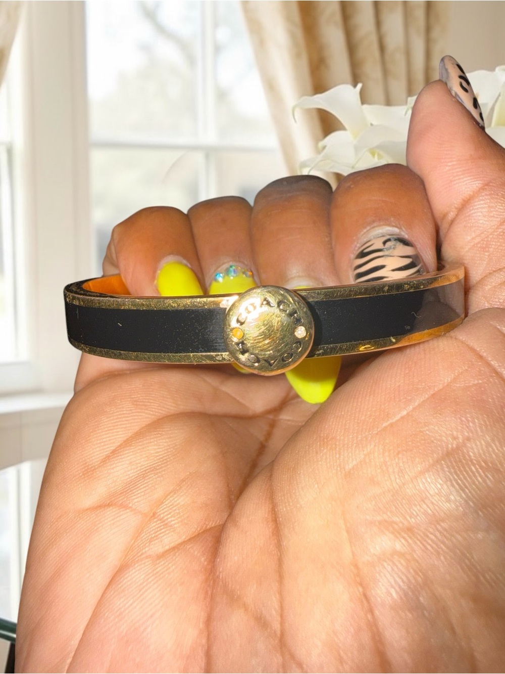 Coach Gold & Black Rivet Enamel Hinged Bangle Bracelet in black and gold